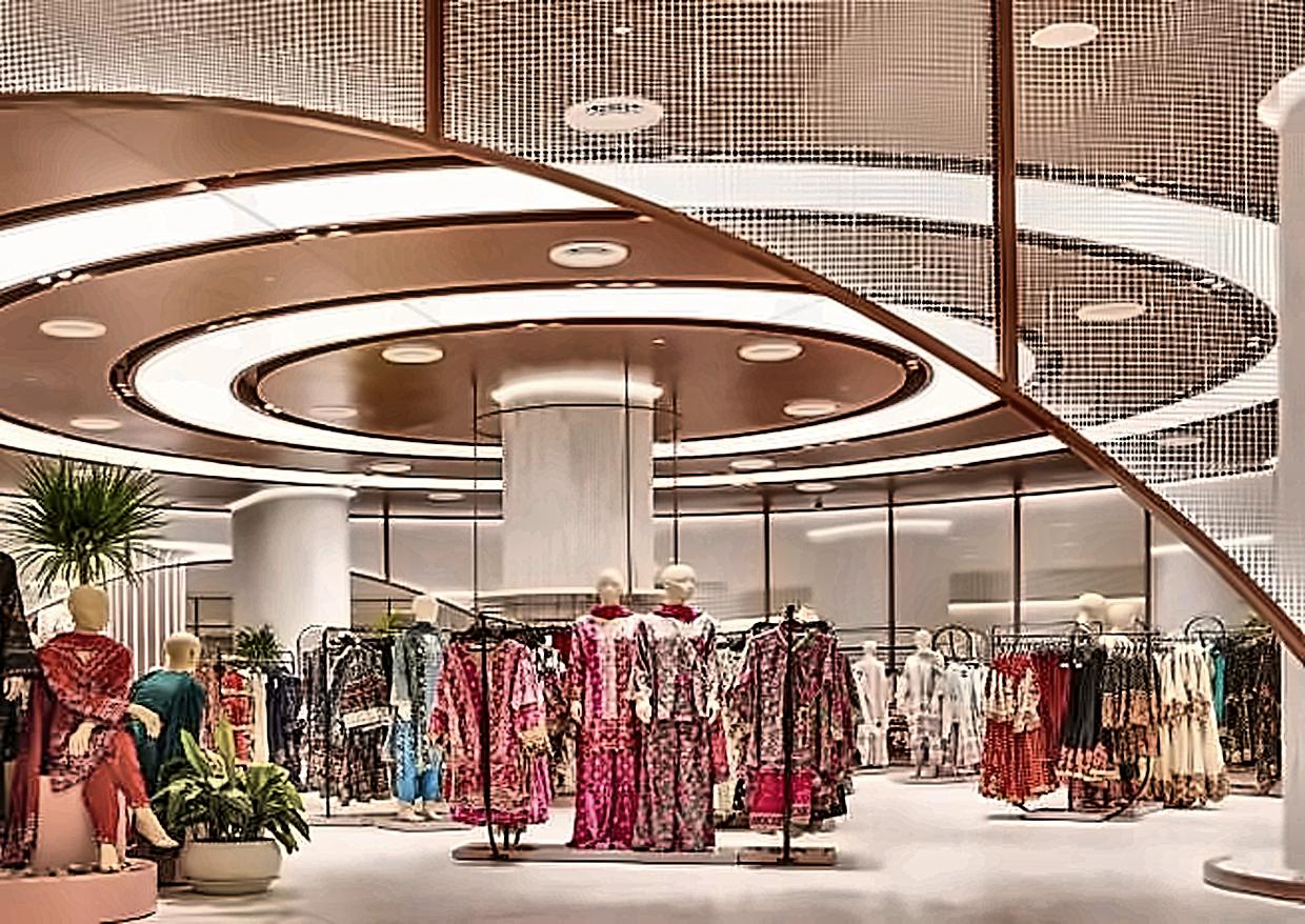 A retail floor beneath a copper spiral ceiling